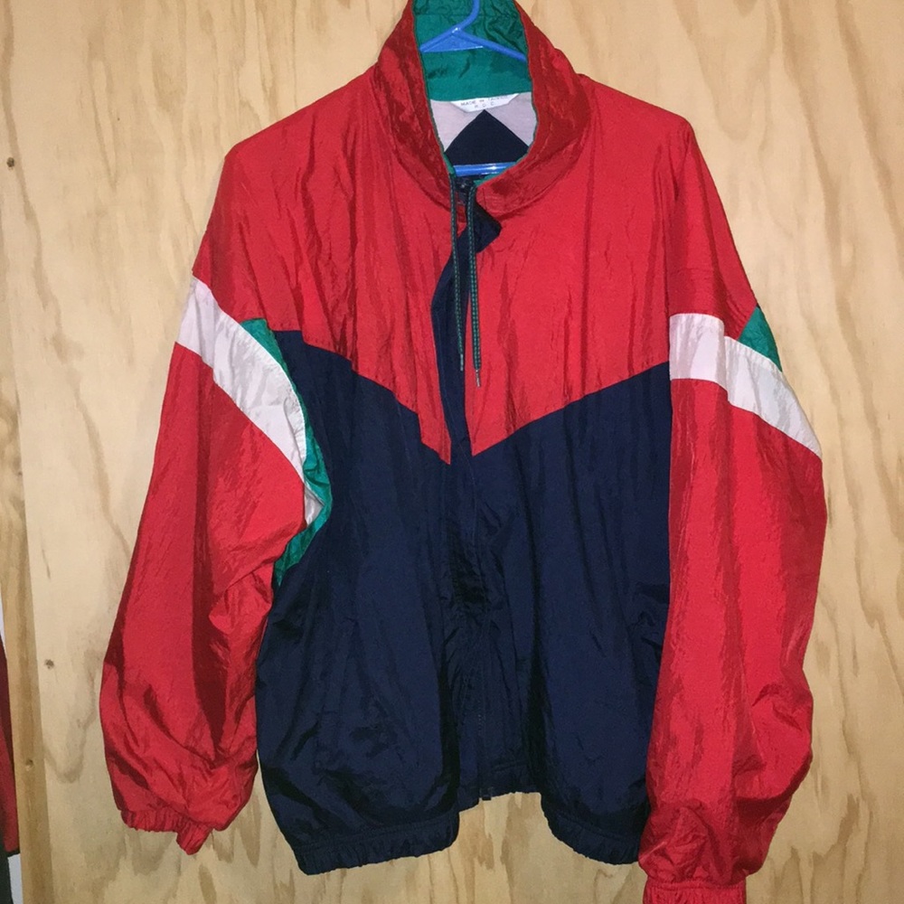 Color blocked. Red, blue, green. Wind breaker